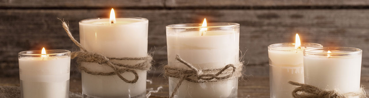 rustic white candles in jars