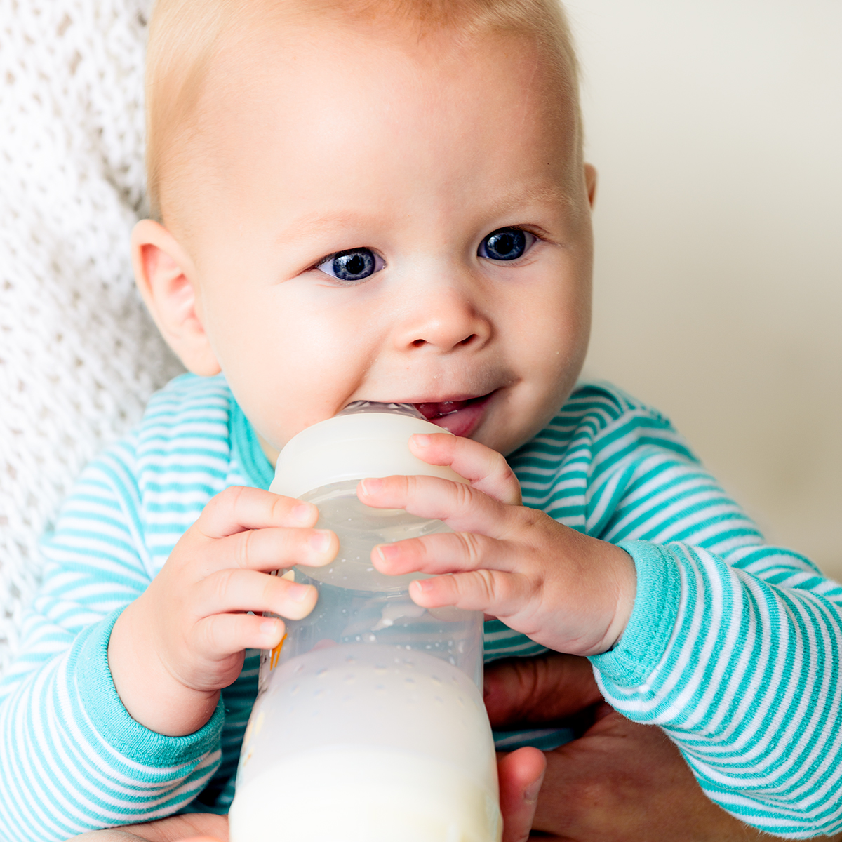 aak-li-blog1-infant baby chewing on bottle